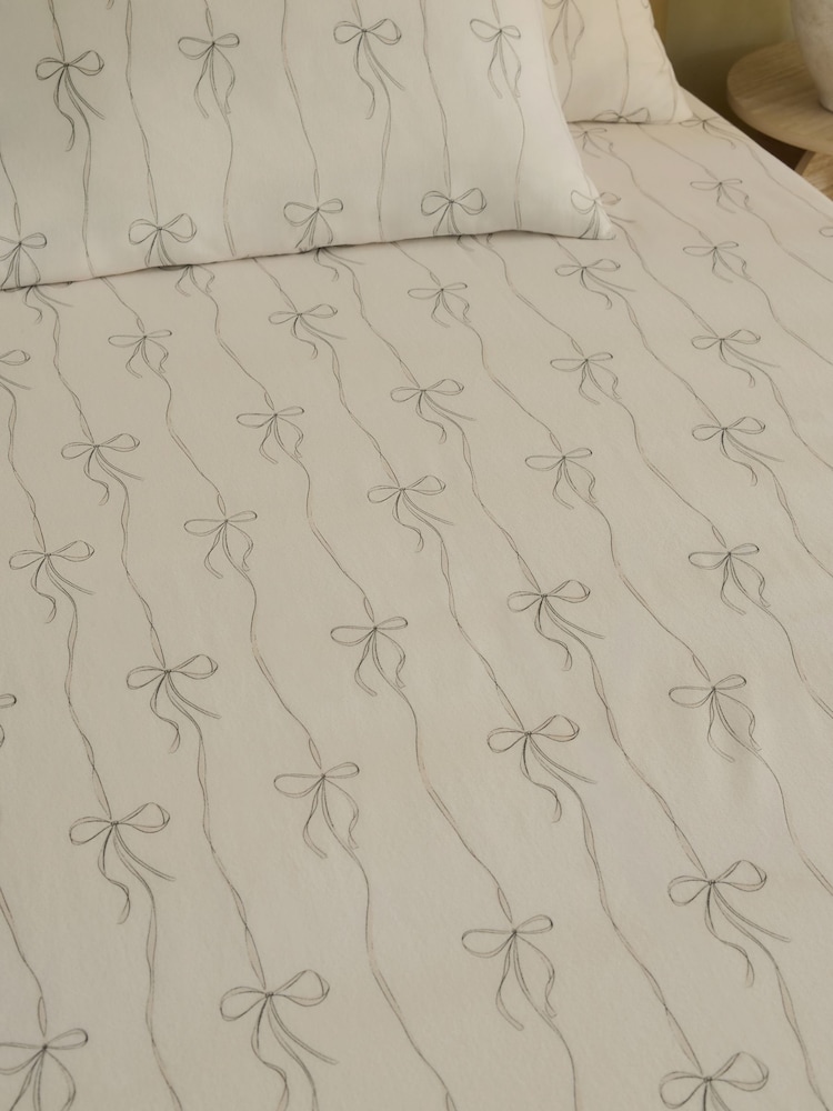 Natural Bows Brushed Cotton Fitted Sheet and Pillowcase Set - Image 1 of 2 Natural Bows Brushed Cotton Fitted Sheet and Pillowcase Set - Image 1 of 2