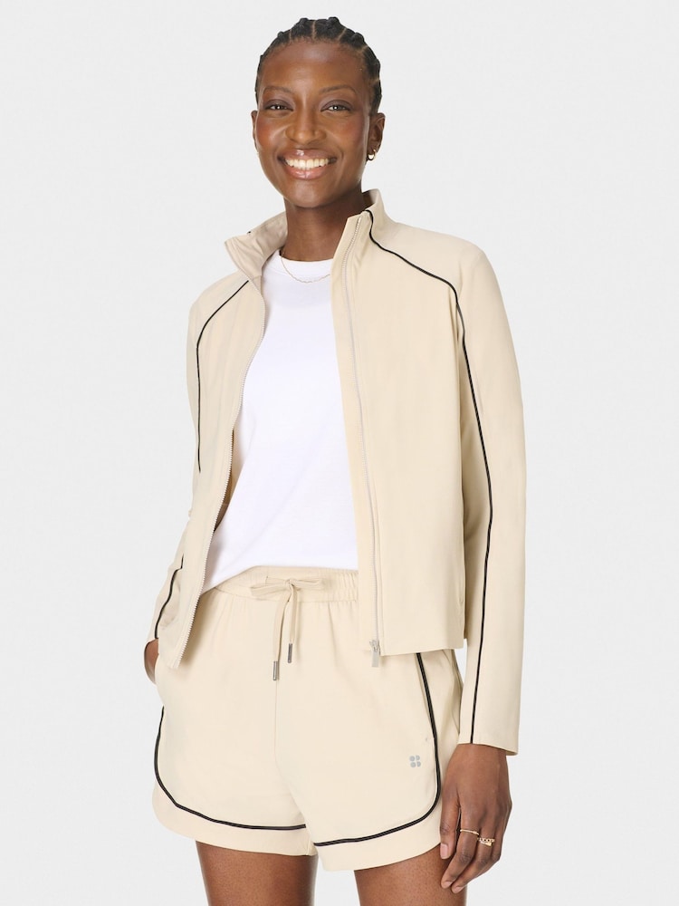 Sweaty Betty Cream Explorer Track Piped Shorts - Image 1 of 6 Sweaty Betty Cream Explorer Track Piped Shorts - Image 1 of 6