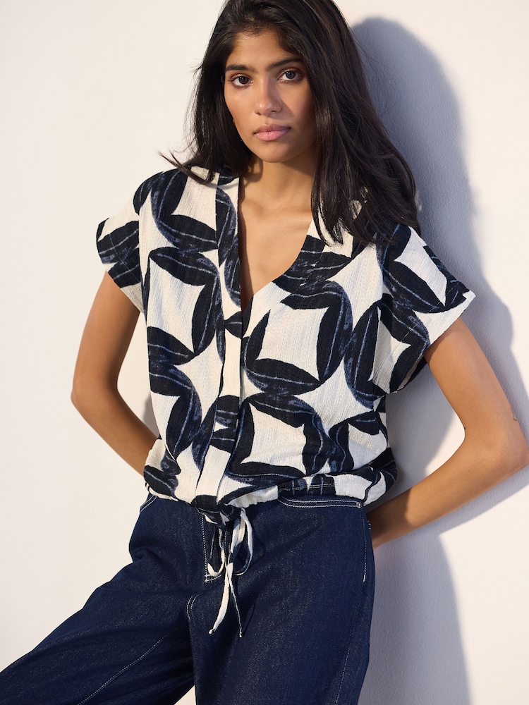 Geo Print Textured V-Neck Tie Front Short Sleeve Top - Image 1 of 8 Geo Print Textured V-Neck Tie Front Short Sleeve Top - Image 1 of 8