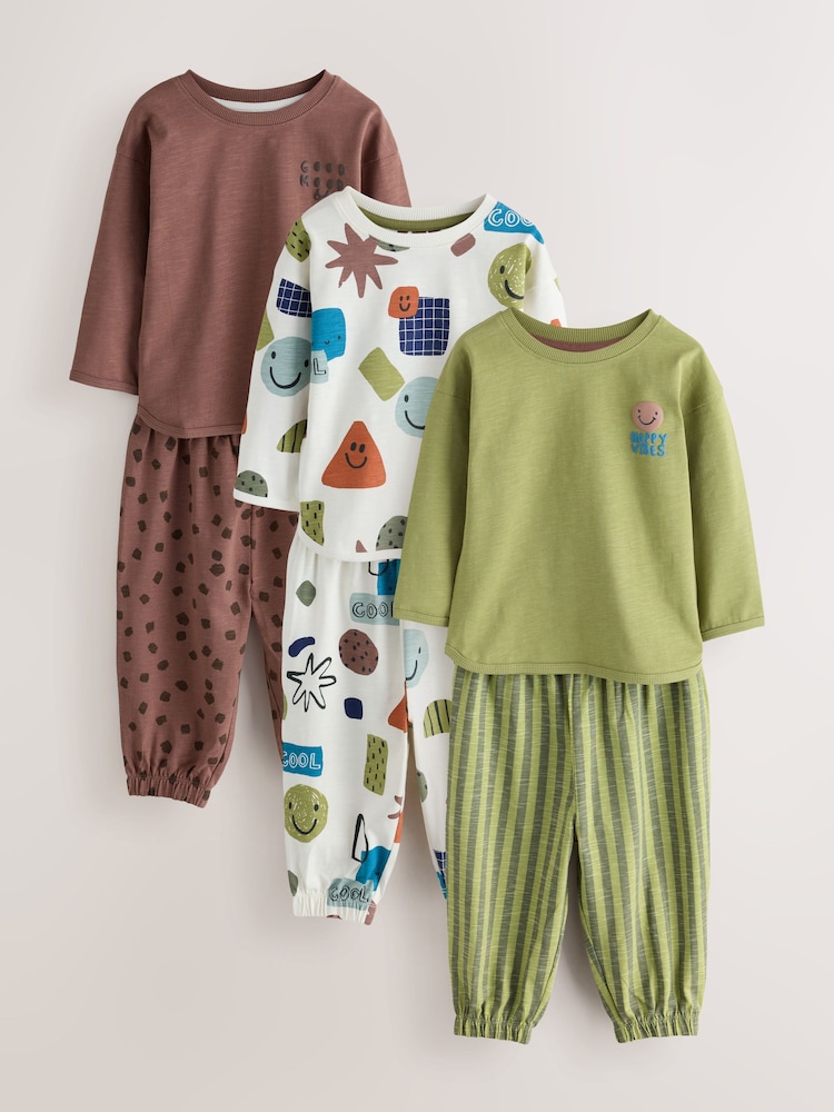 Green/Ecru/Tan Smiley Shapes Oversized Pyjamas 3 Pack (9mths-10yrs) - Image 1 of 7 Green/Ecru/Tan Smiley Shapes Oversized Pyjamas 3 Pack (9mths-10yrs) - Image 1 of 7