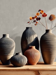 Galerie Wallcoverings Grey Terra Plain Texture Clay 10.05M Wallpaper - Image 1 of 2