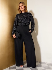 Friends Like These Black Curve Floral Sequin Belted Long Sleeve Jumpsuit - Image 1 of 6