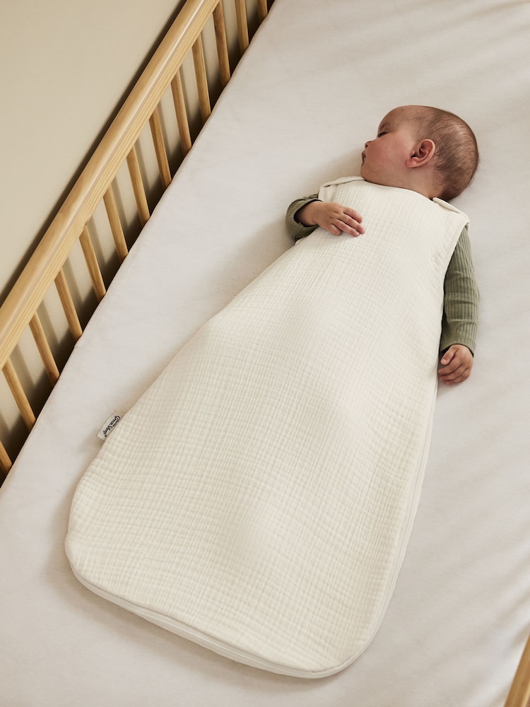 The Little Green Sheep Ecru Muslin 1.0 Tog Baby Sleeping Bag - Image 1 of 6 The Little Green Sheep Ecru Muslin 1.0 Tog Baby Sleeping Bag - Image 1 of 6