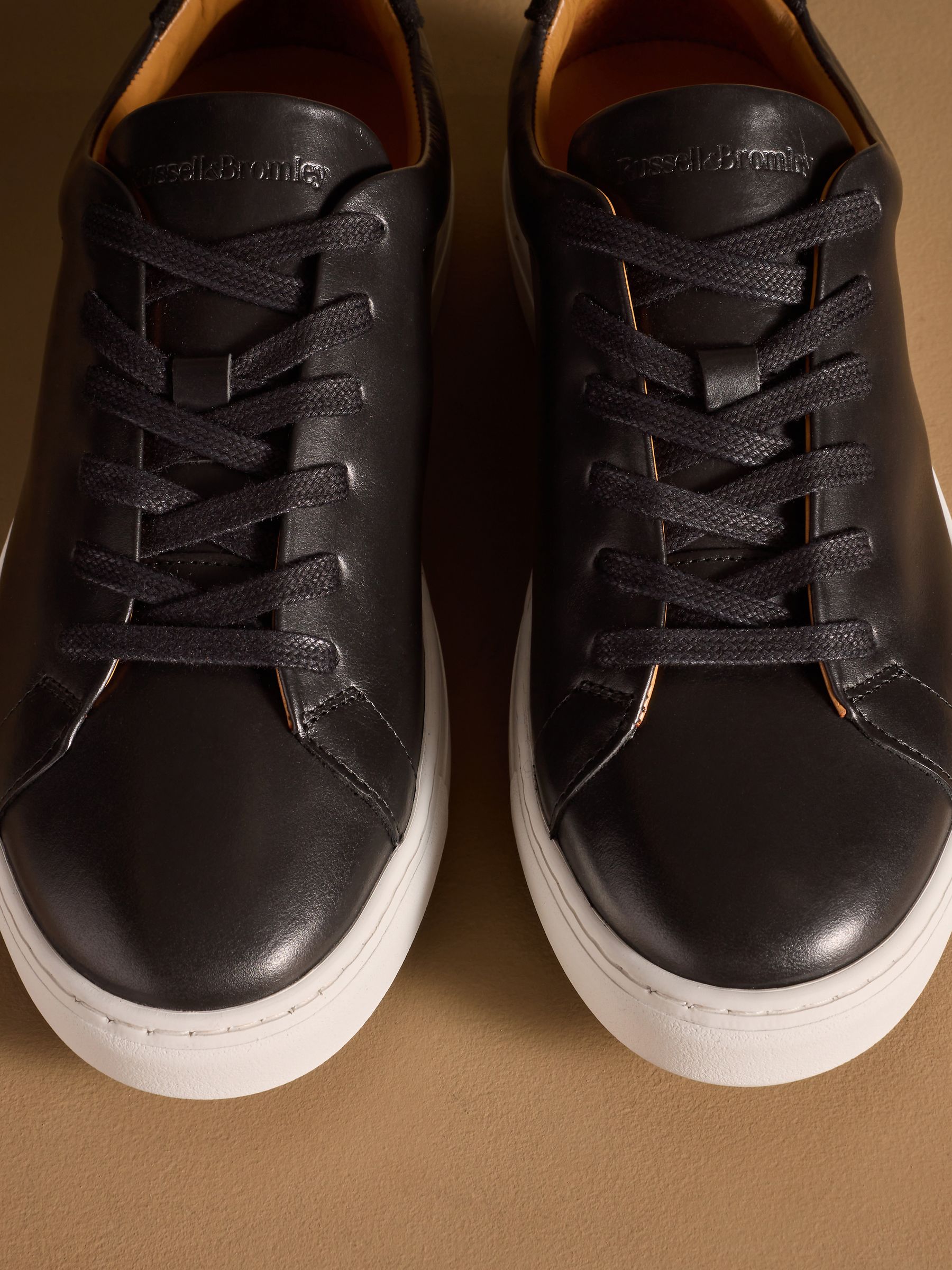 Buy Russell & Bromley Black Redburn Classic Trainers from the Next