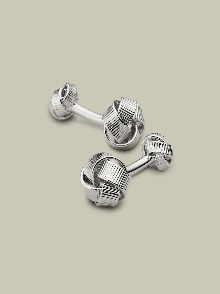 Charles Tyrwhitt Grey Silver Reversible Knot Cufflink - Image 1 of 2 Charles Tyrwhitt Grey Silver Reversible Knot Cufflink - Image 1 of 2