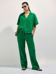 River Island Green Elasticated Linen Blend Tapered Leg Trousers - Image 1 of 4