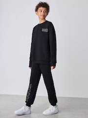 Baker by Ted Baker Black Foil Oversized Graphic Sweatshirt and Joggers Set - Image 1 of 6