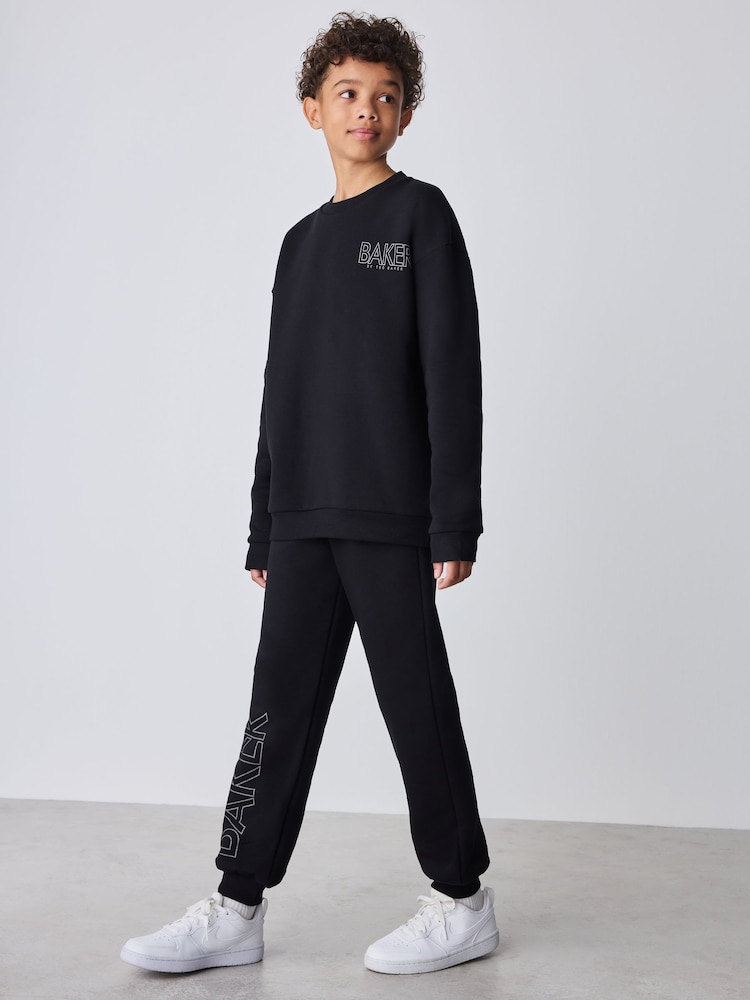 Baker by Ted Baker Black Foil Oversized Graphic Sweatshirt and Joggers Set - Image 1 of 6 Baker by Ted Baker Black Foil Oversized Graphic Sweatshirt and Joggers Set - Image 1 of 6