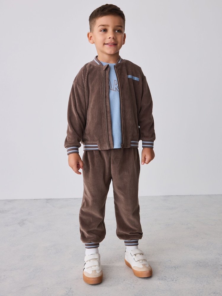 Baker by Ted Baker Brown 3 Piece Cord Jacket Blue T-Shirt and Joggers Set - Image 1 of 17 Baker by Ted Baker Brown 3 Piece Cord Jacket Blue T-Shirt and Joggers Set - Image 1 of 17