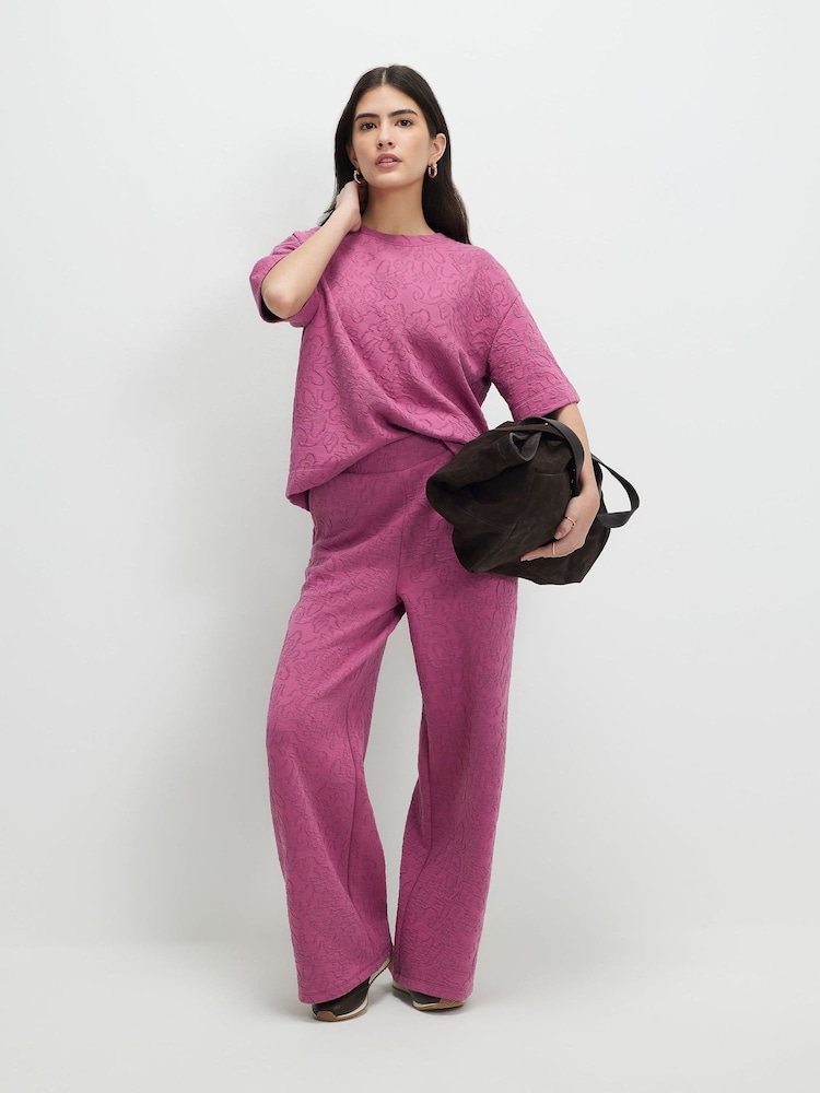 River Island Pink Petite Jacquard Wide Leg Trousers - Image 1 of 4 River Island Pink Petite Jacquard Wide Leg Trousers - Image 1 of 4