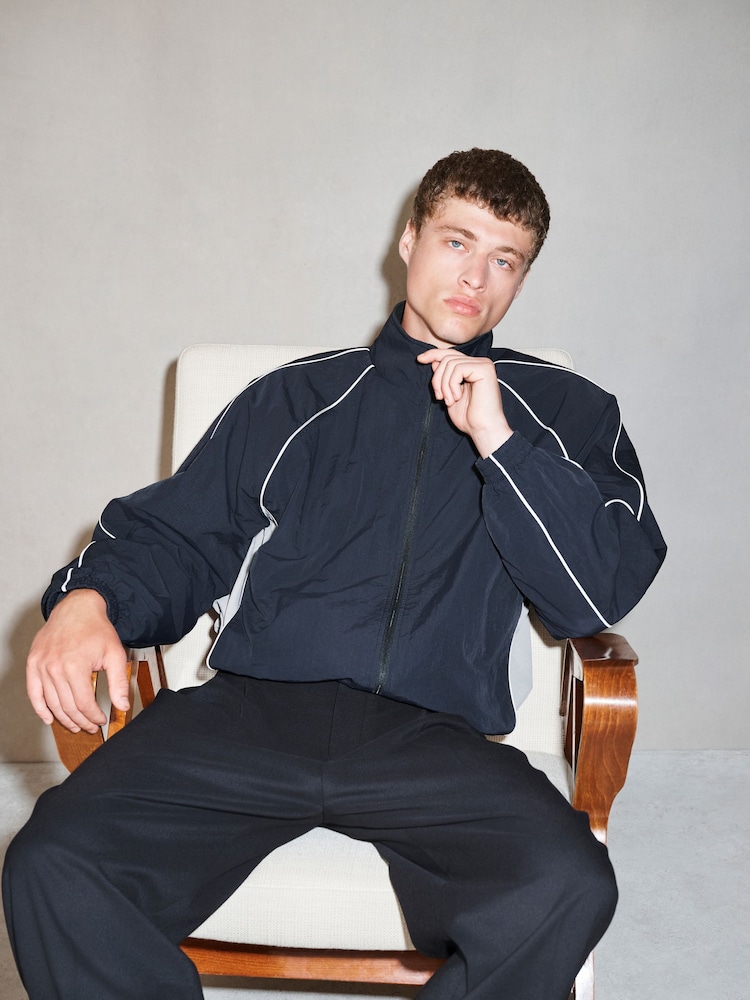 Black EDIT Piped Lightweight Funnel Neck Windbreaker Jacket - Image 1 of 12 Black EDIT Piped Lightweight Funnel Neck Windbreaker Jacket - Image 1 of 12