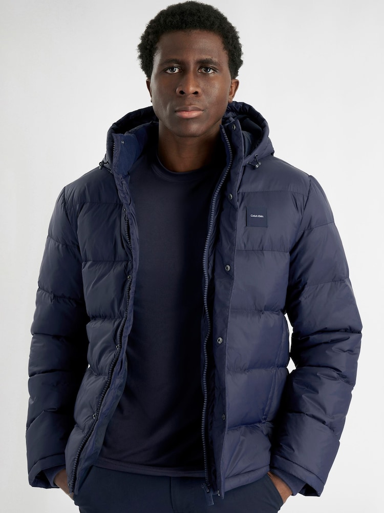Calvin Klein Golf Blue Vanta Hooded Puffa Jacket - Image 1 of 10 Calvin Klein Golf Blue Vanta Hooded Puffa Jacket - Image 1 of 10