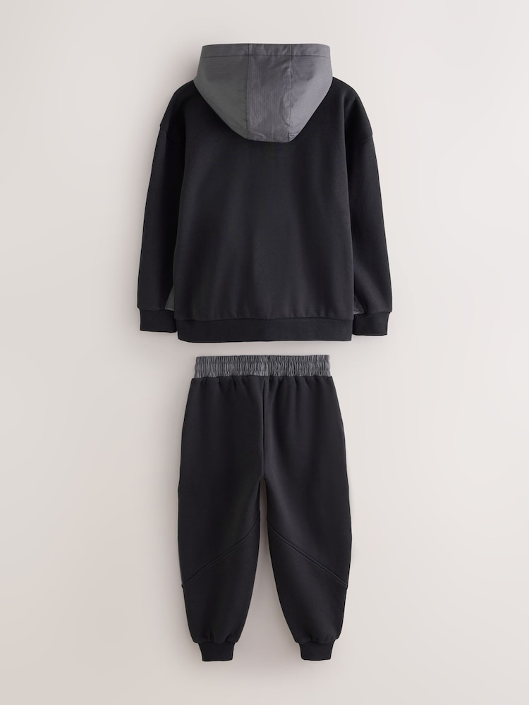 Baker by Ted Baker Black/Grey Oversized Blue Funnel Neck Hoodie and Joggers Set - Image 2 of 7 Baker by Ted Baker Black/Grey Oversized Blue Funnel Neck Hoodie and Joggers Set - Image 2 of 7
