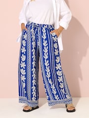 Yours Curve Blue Aztec Leaf Wide Leg Trousers - Image 1 of 5