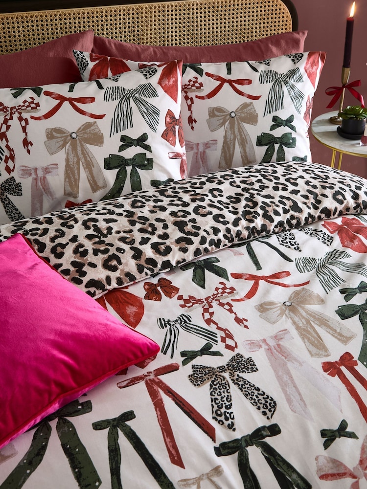 Furn Leopard Mila Bows Reversible Duvet Cover and Pillowcase Set - Image 1 of 4 Furn Leopard Mila Bows Reversible Duvet Cover and Pillowcase Set - Image 1 of 4
