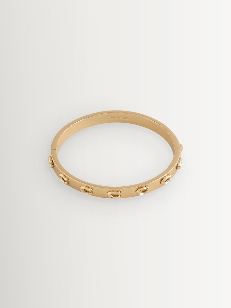 COACH Gold Tone Signature C Hinged Bangle Bracelet - Image 1 of 1 COACH Gold Tone Signature C Hinged Bangle Bracelet - Image 1 of 1