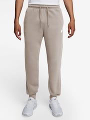 Partícula gris - Pantalones de chándal de polar con bajo ajustado Club de Nike - Imagen 1 de 3
