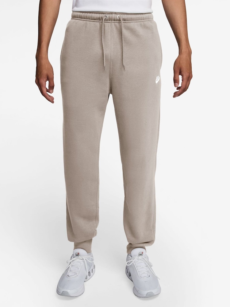 Partícula gris - Pantalones de chándal de polar con bajo ajustado Club de Nike - Imagen 1 de 3