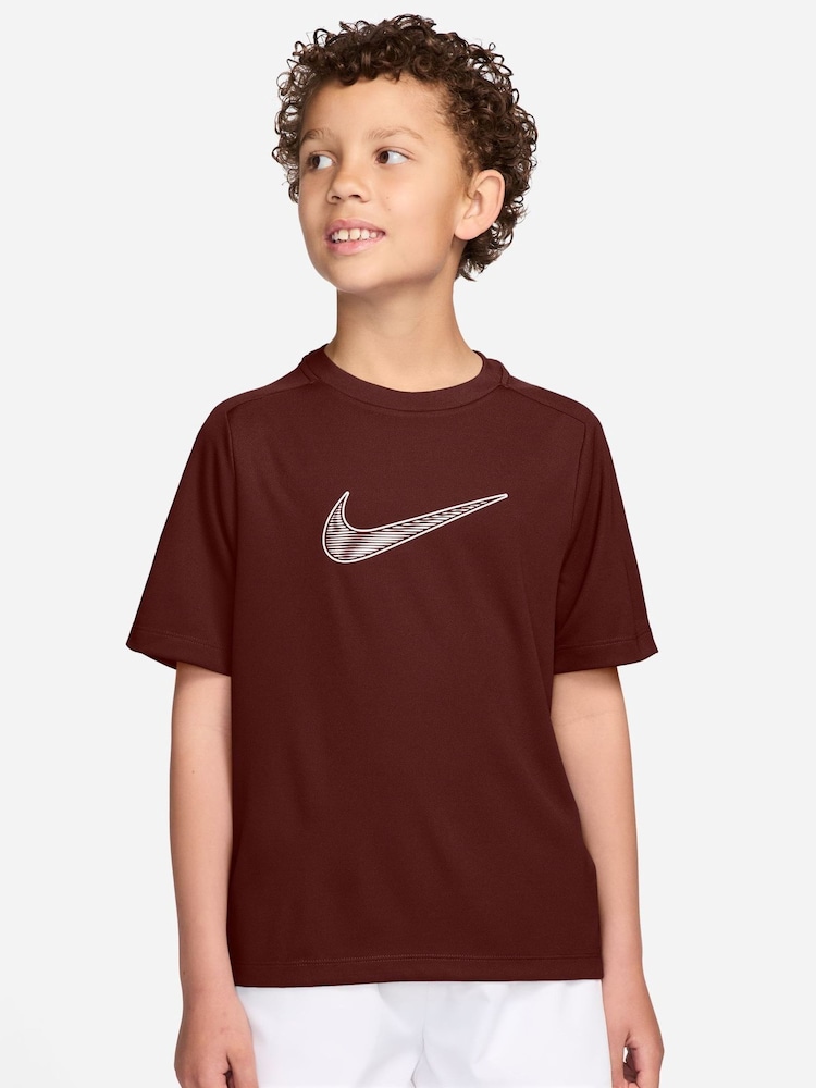بني تمر داكن - تيشرت Dri-FIT متعدد الاستخدامات من Nike - صورة 1 من 3 بني تمر داكن - تيشرت Dri-FIT متعدد الاستخدامات من Nike - صورة 1 من 3