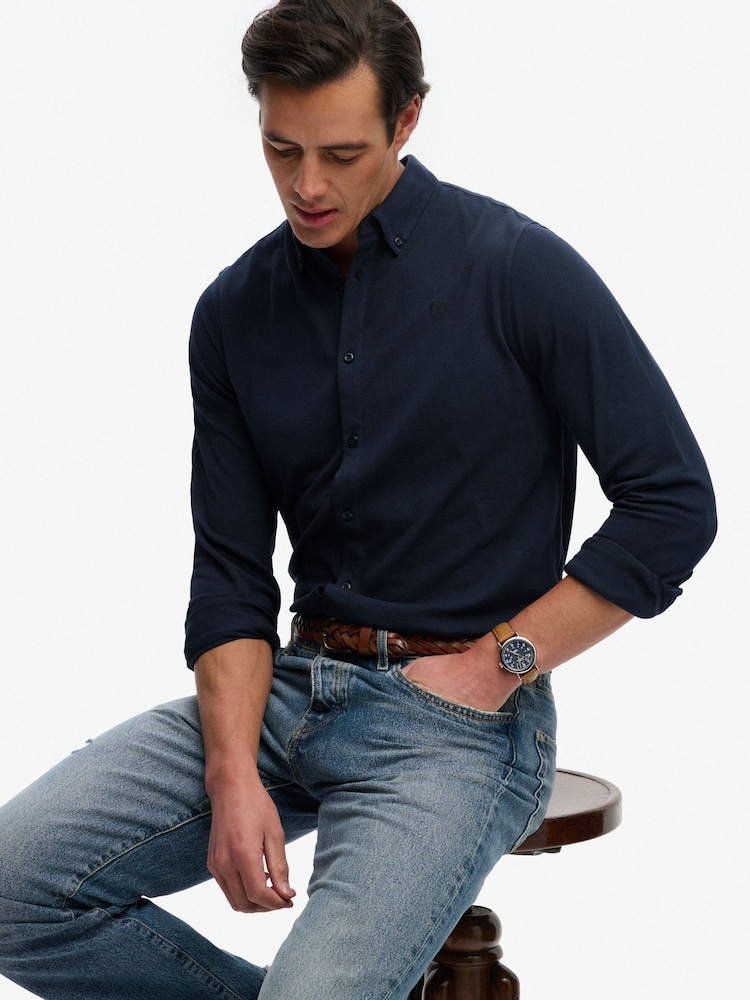 Superdry Blue Vintage Destroy Pique Long Sleeve Shirt - Image 1 of 7 Superdry Blue Vintage Destroy Pique Long Sleeve Shirt - Image 1 of 7