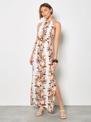 كريم - فستان ماكسي بحمَّالة رقبة بطبعة ورق شجر استوائية من Apricot - Image 1 of 4
