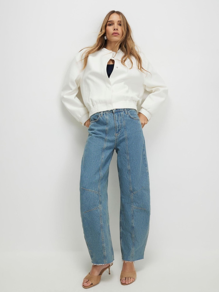 River Island Blue High Rise Seamed Raw Hem Barrel Jeans - Image 1 of 4 River Island Blue High Rise Seamed Raw Hem Barrel Jeans - Image 1 of 4