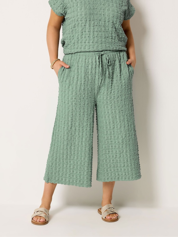 Yours Curve Green Bubble Textured Cropped Trousers - Image 1 of 5 Yours Curve Green Bubble Textured Cropped Trousers - Image 1 of 5