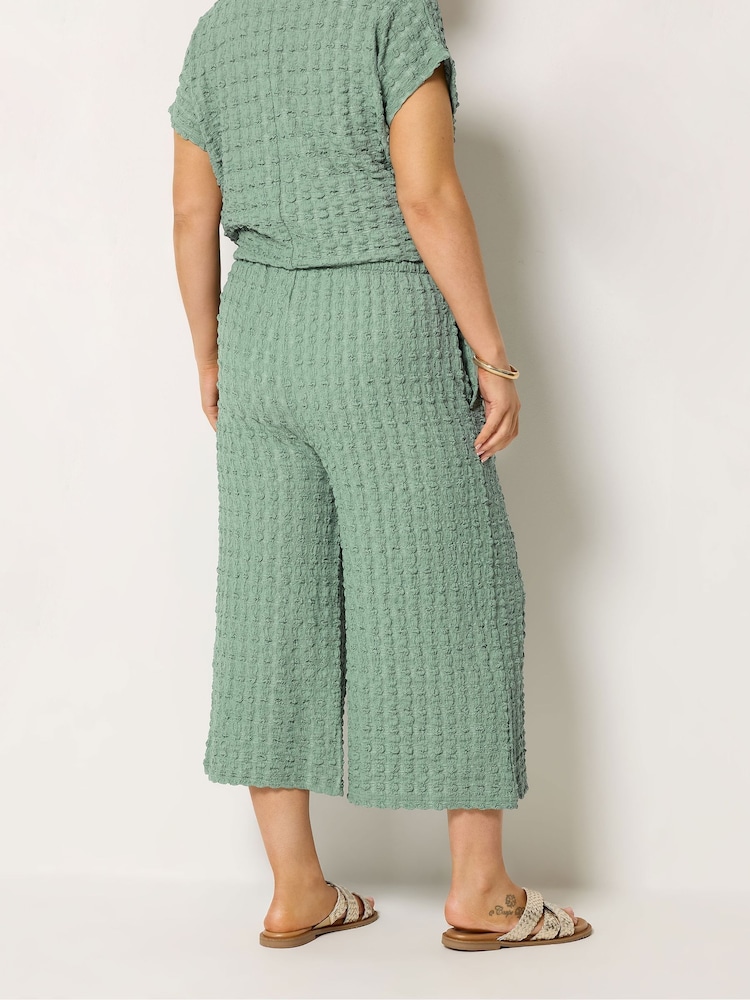 Yours Curve Green Bubble Textured Cropped Trousers - Image 2 of 5 Yours Curve Green Bubble Textured Cropped Trousers - Image 2 of 5