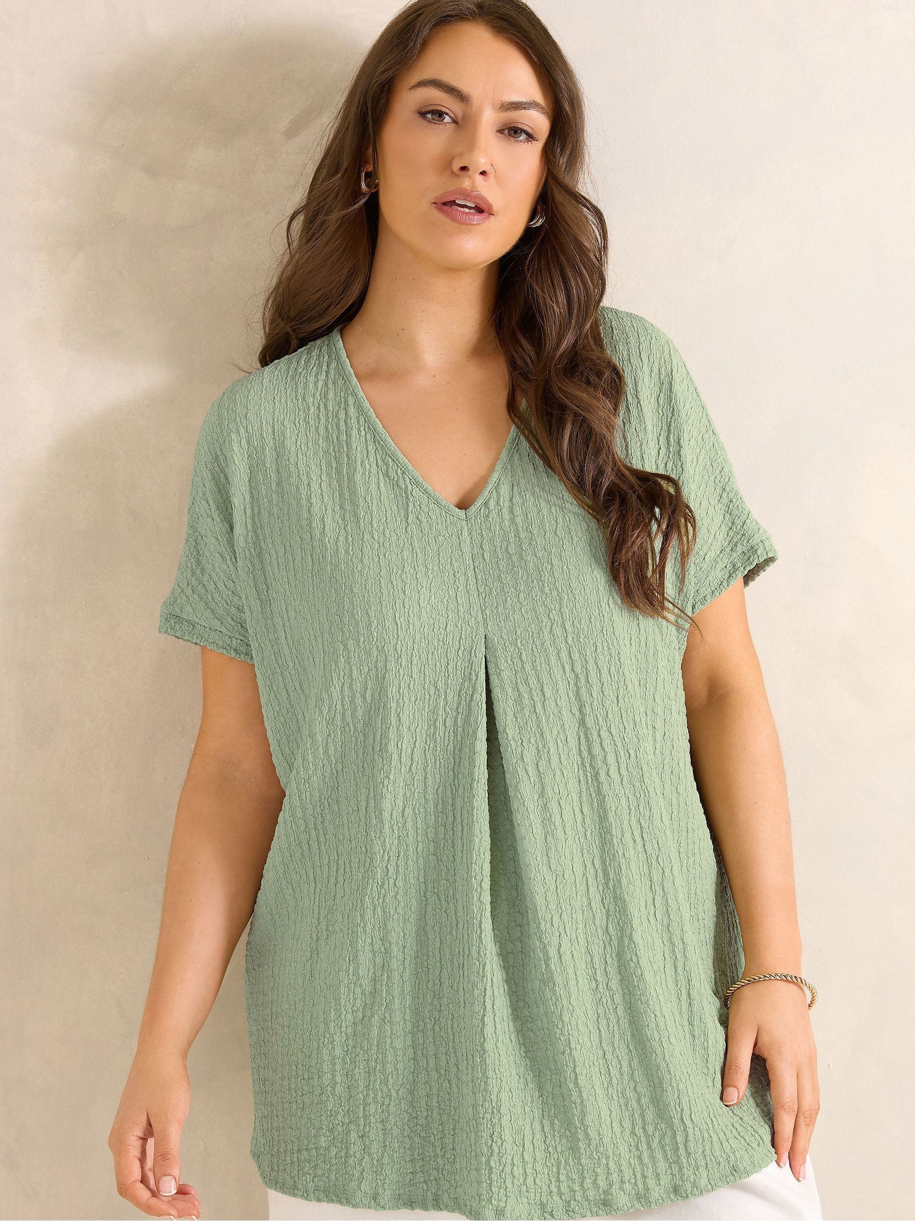 Evans Women's Green Grown On Sleeve Pleated Swing Top
