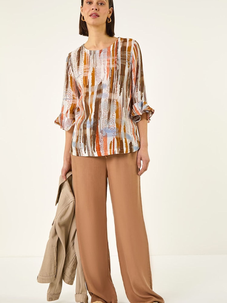 رداء عُلوي بطبعة تجريدية وأكمام كشكشة من Roman - Image 2 of 5