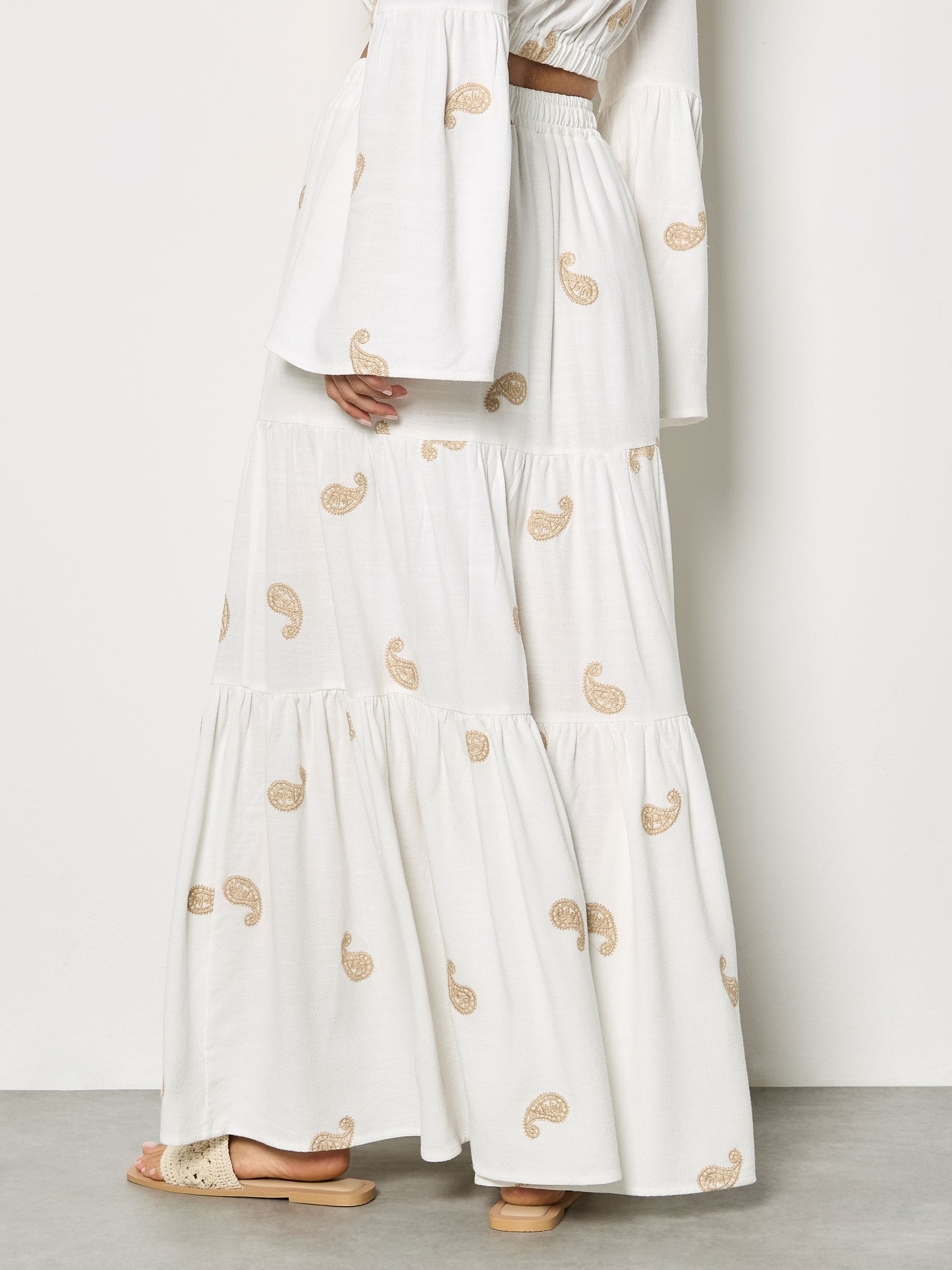 Buy Apricot Cream Paisley Embroidered Tiered Maxi Skirt from the