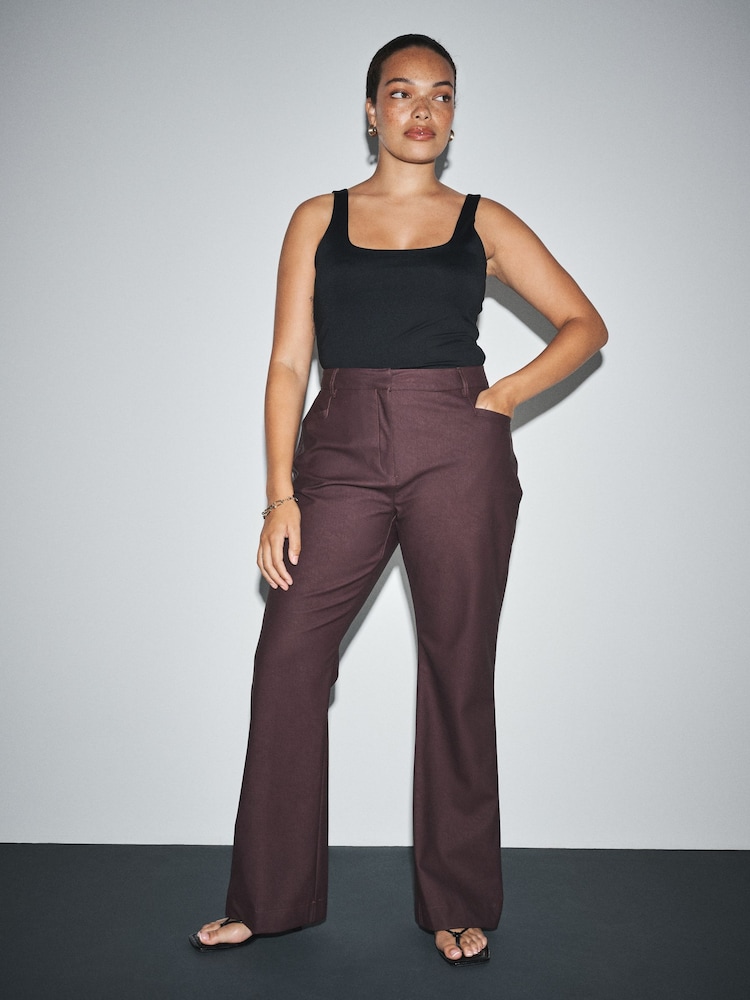 Burgundy Red Hourglass Faux Leather Bootcut Trousers - Image 1 of 4 Burgundy Red Hourglass Faux Leather Bootcut Trousers - Image 1 of 4