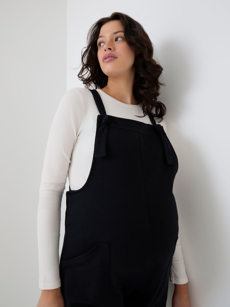 JoJo Maman Bébé Black Maternity Jersey Side Pocket Dungaree - Image 1 of 4 JoJo Maman Bébé Black Maternity Jersey Side Pocket Dungaree - Image 1 of 4