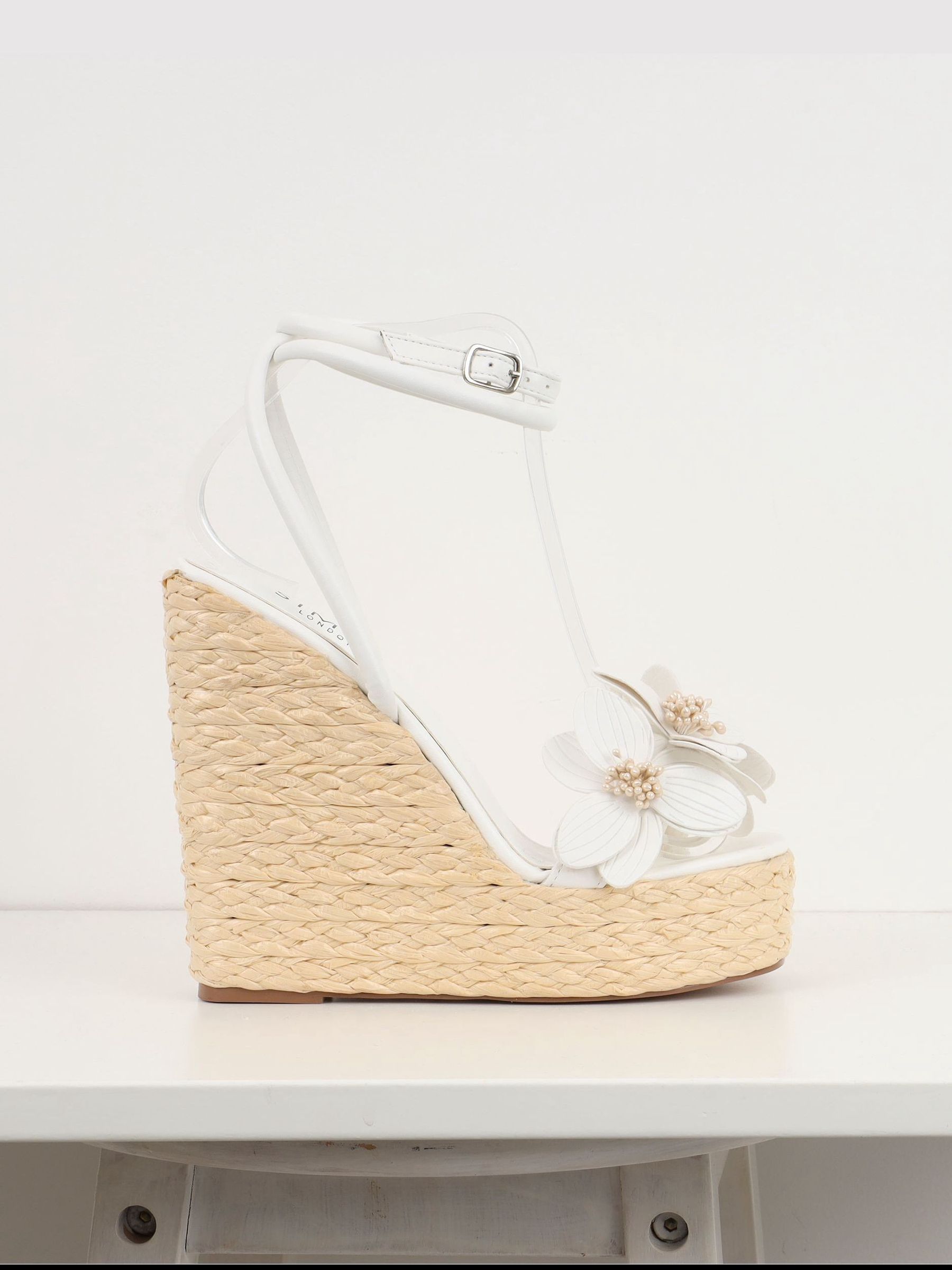 Buy Simmi London White Jolie Flower Detail Wedges from Next USA
