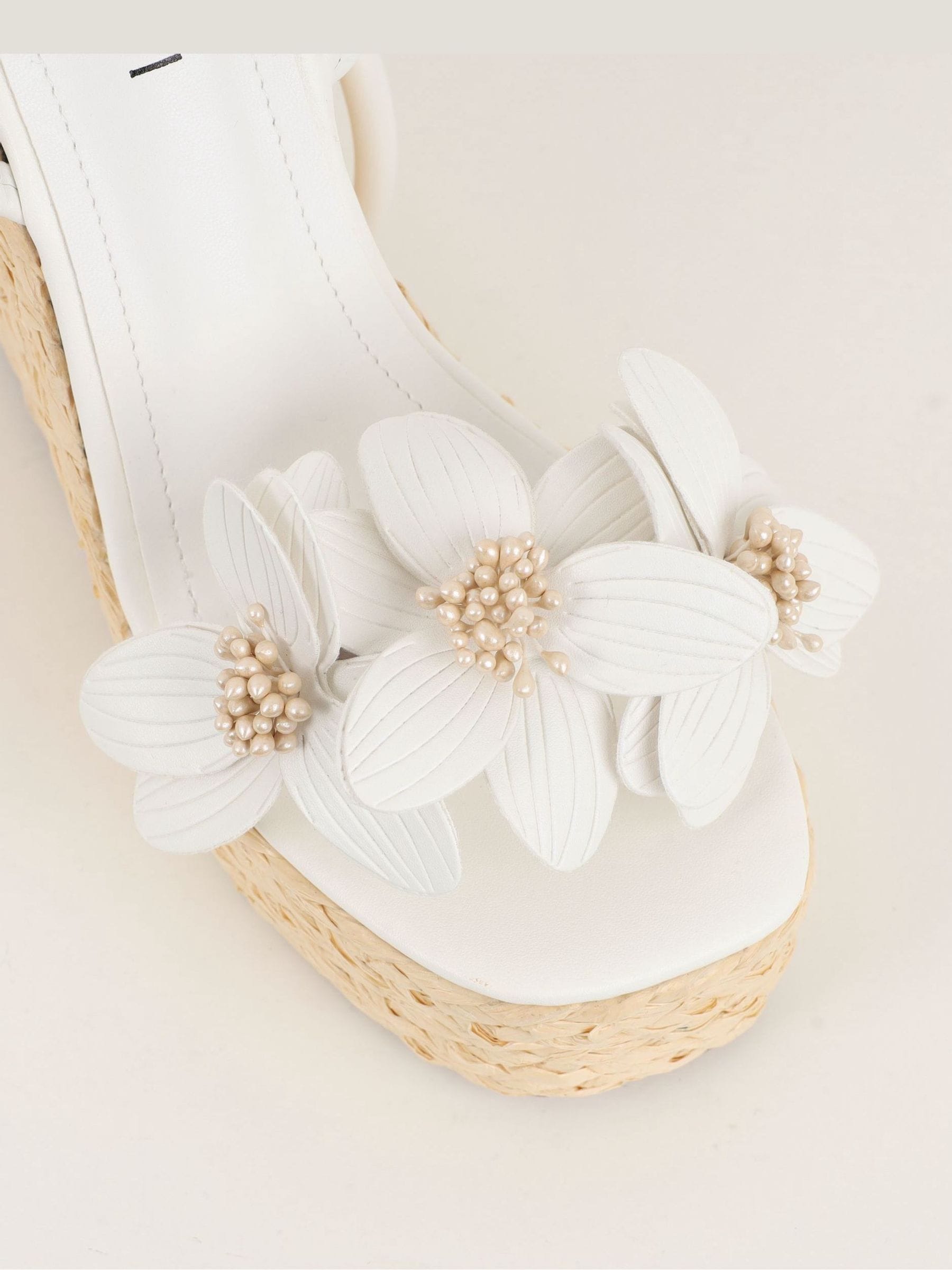 Buy Simmi London White Jolie Flower Detail Wedges from Next USA