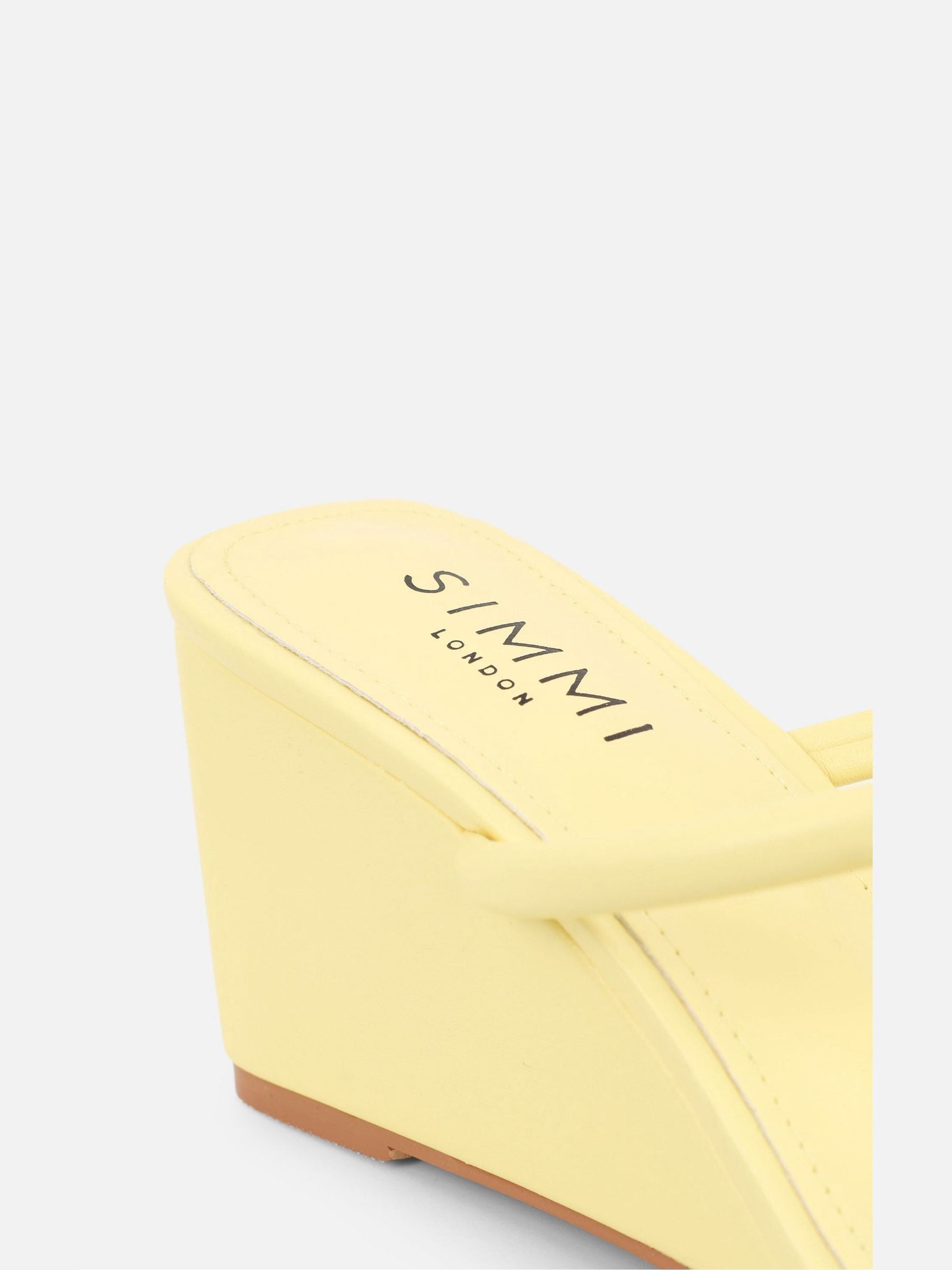 YELLO　MIDNIGHT CHASE MULES Buy Simmi London Yellow Dianna Wedge Heeled Mules from Next India
