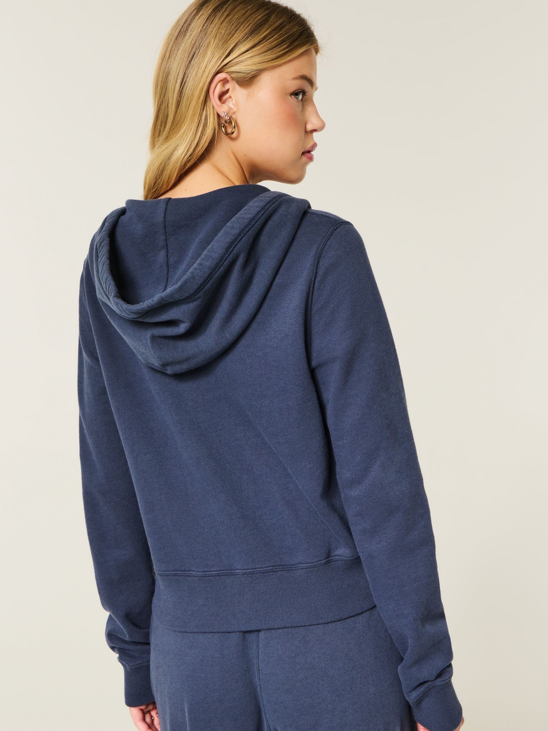 Buy Hollister Blue Heritage Logo Shrunken Hoodie from Next USA