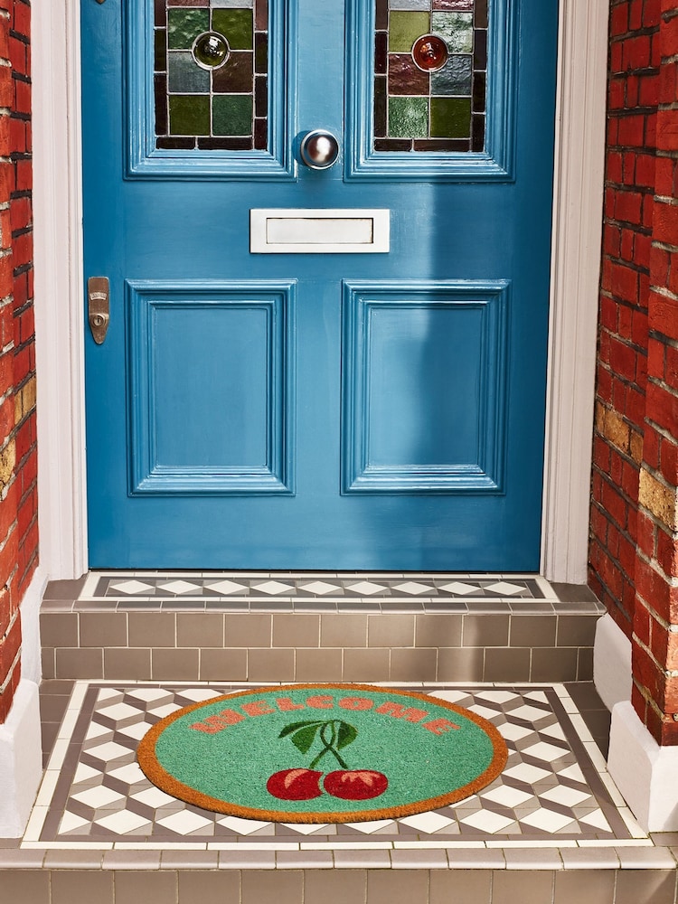Oliver Bonas Green Welcome Cherries Round Doormat - Image 1 of 4