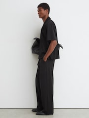 Reiss Black Walker Belted Relaxed-Fit Pleated Trousers - Image 1 of 7