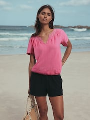 Neon-Rosa - Kurzarm-Top mit Notch-Ausschnitt und gerafftem Bubble-Saum - Bild 1 von 4