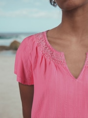 Neon-Rosa - Kurzarm-Top mit Notch-Ausschnitt und gerafftem Bubble-Saum - Bild 4 von 4