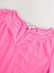 Fluorescent Pink Short Sleeve Notch Neck Shirred Bubblehem Top - Image 5 of 6