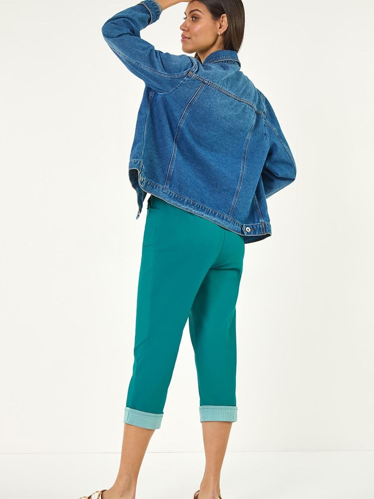 Pantalones elásticos capri con detalle en contraste de Roman - Imagen 1 de 5