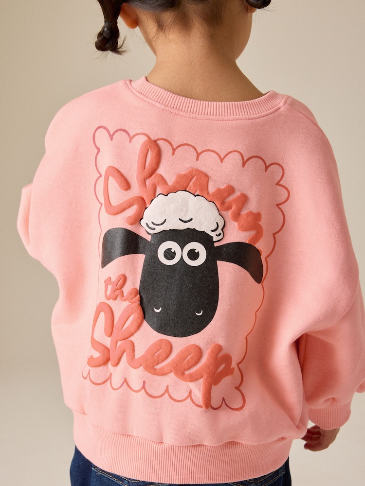 Coral Pink Shaun the Sheep Crew Neck Sweatshirt (9mths-7yrs) - Image 1 of 8 Coral Pink Shaun the Sheep Crew Neck Sweatshirt (9mths-7yrs) - Image 1 of 8