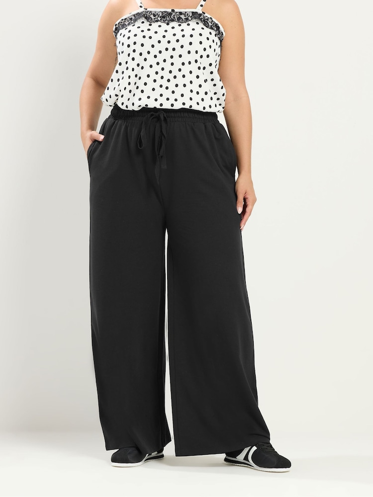Yours Curve Black Wide Leg Joggers - Image 1 of 5 Yours Curve Black Wide Leg Joggers - Image 1 of 5