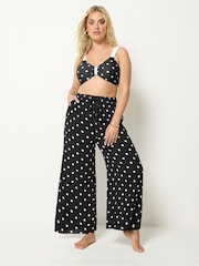 Yours Curve Black Polka Dot Wide Leg Crinkle Trousers - Image 1 of 5