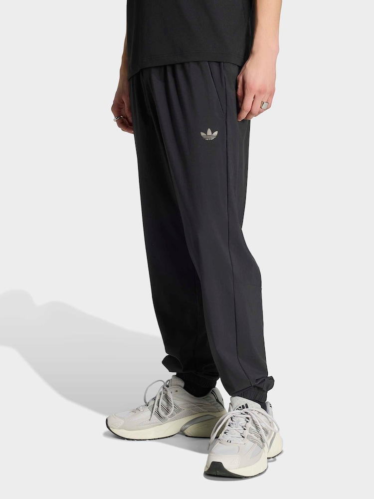 adidas Originals Black Tech Trefoil Essentials Track Pants - Image 1 of 6