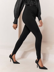 Lipsy x Gemma Owen Black Structured Jersey Stirrup Leggings - Image 1 of 5