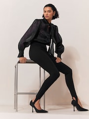 Lipsy x Gemma Owen Black Structured Jersey Stirrup Leggings - Image 4 of 5