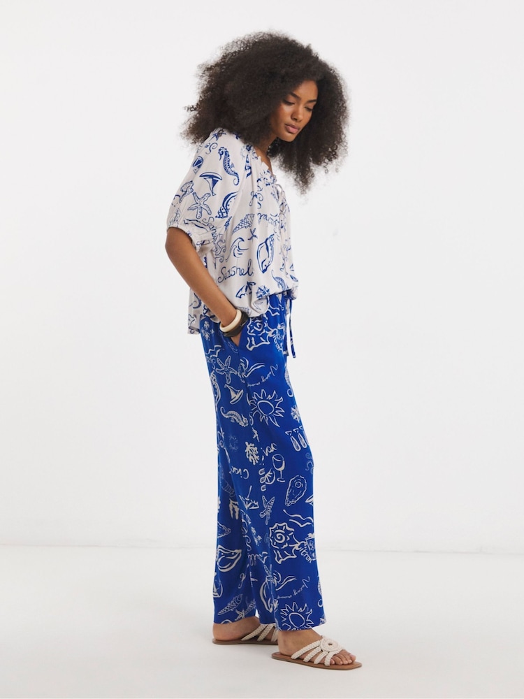 Simply Be Blue Shell Print Wide Leg Crinkle Trousers - Image 1 of 4